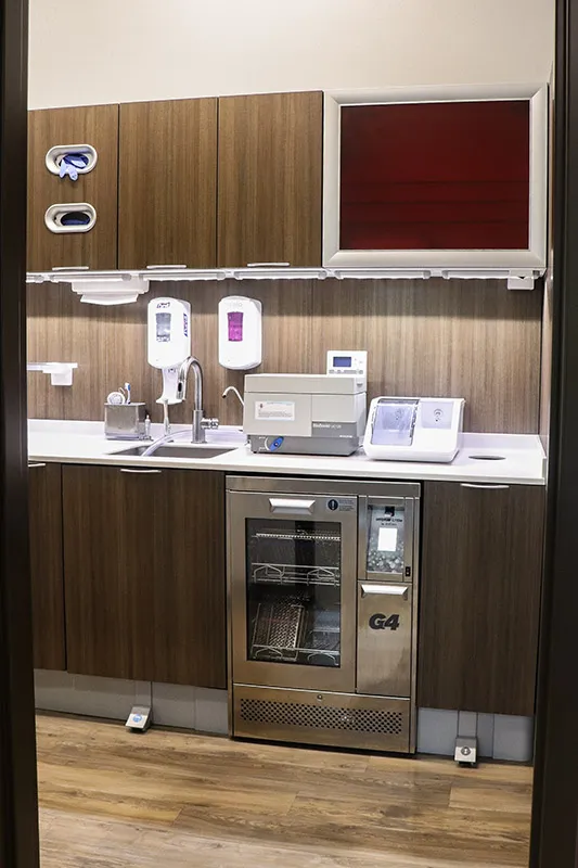Sterilization area in Wright County Family Dental office with modern equipment and cabinets.