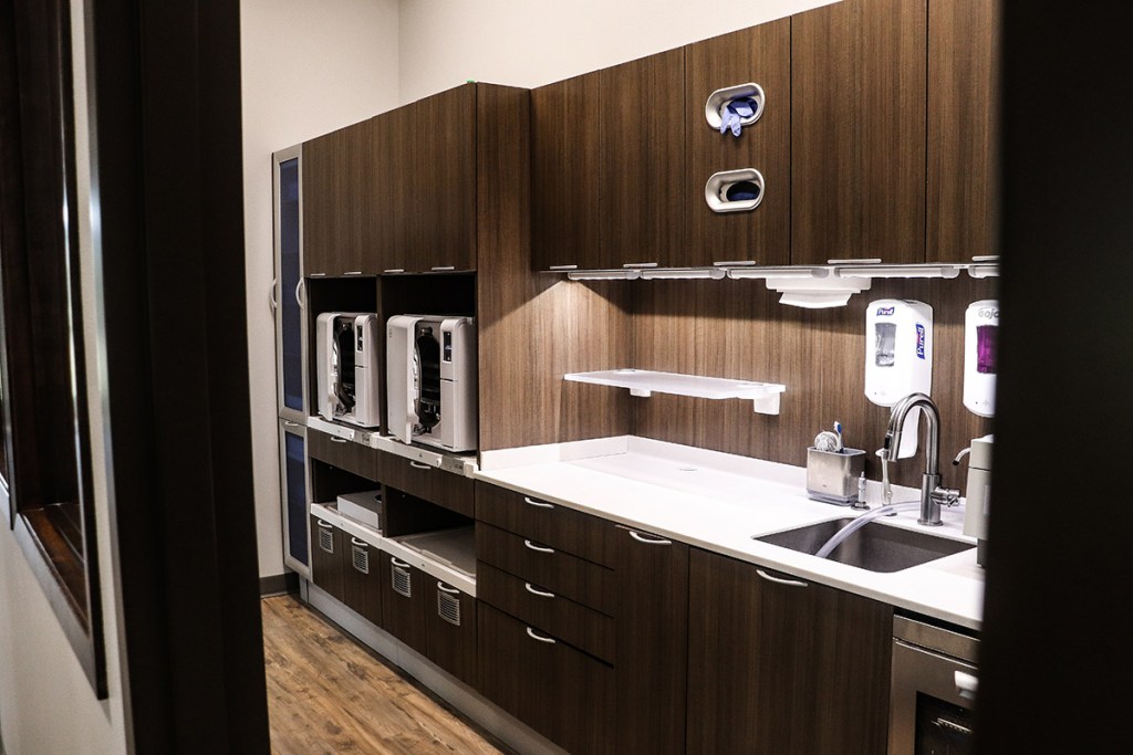 Sterilization area in Wright County Family Dental office with modern equipment and cabinets.